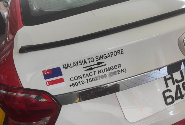 シンガポールからジョホールバルの国際タクシーと記載